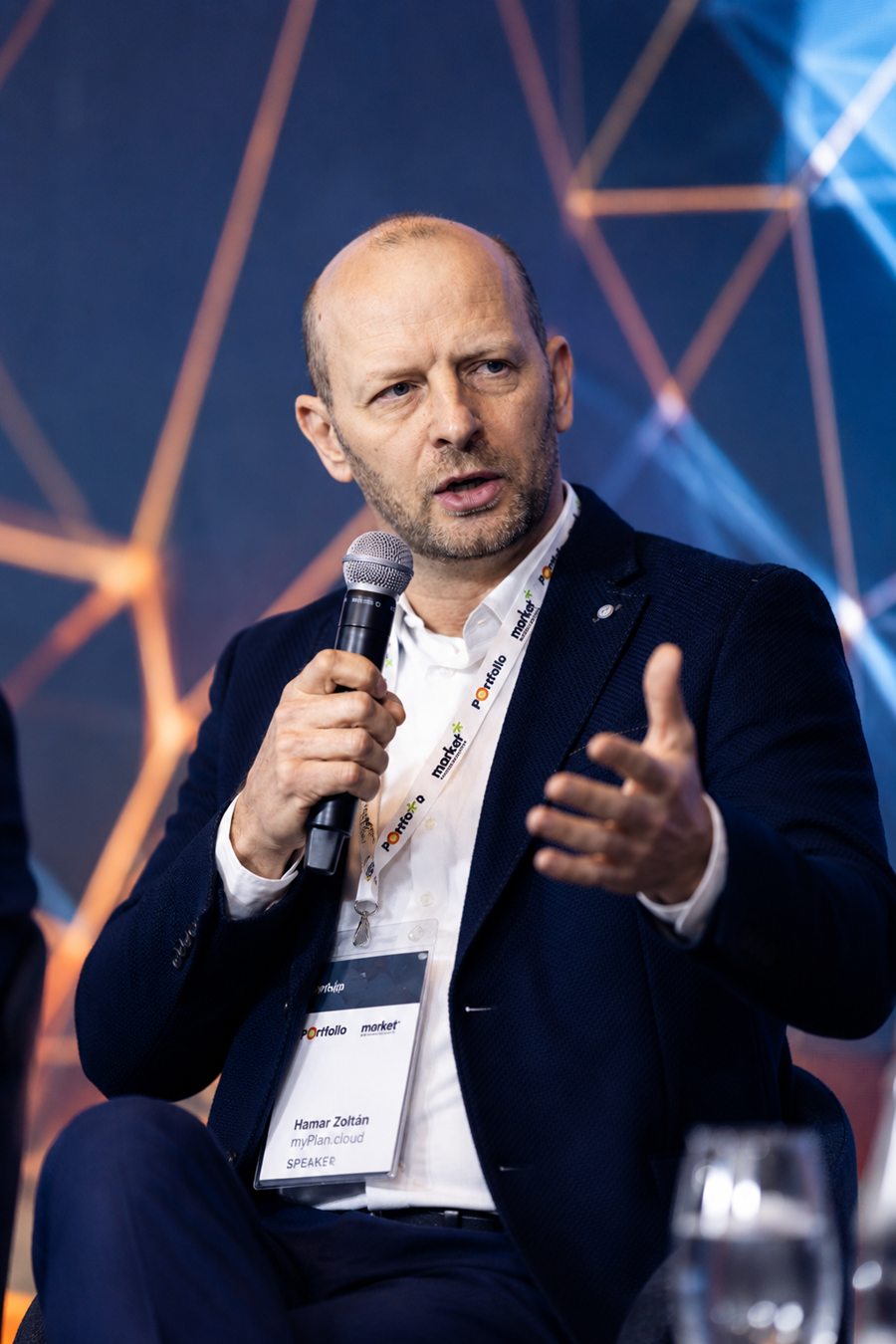 Zoltán Hamar, CEO of myPlan.cloud, speaking on stage